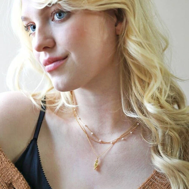 Feminine Figure Pendant Necklace in Gold